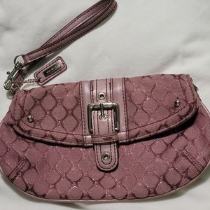 Nine West clutch/wristlet. Purple with metallic details. Snap closure.
